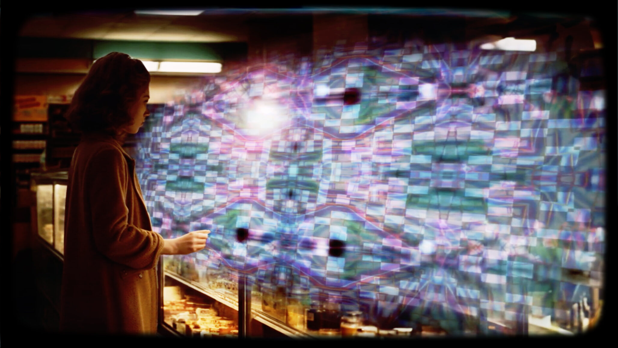 Link to Participant Thirty-five's private page. A picture of a woman standing in a grocery store aisle. Before her a mesmerising kaleidoscope with hues of sapphire and tangerine, enveloping her field of vision and obscuring reality from sight.